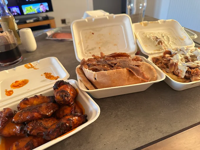 Wings, doner and wrap takeaway spread
